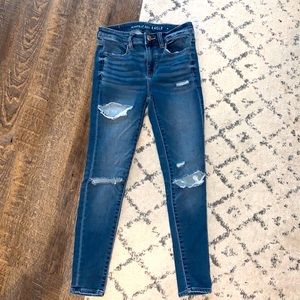 American Eagle next level stretch ripped jeans